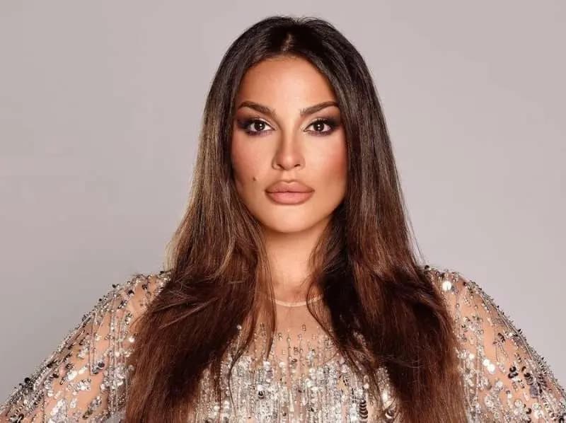 نادين نسيب نجيم تكشف سر تأجيل حفل زفافها