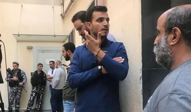 اقتحام مصرف جديد.. الأم في الداخل والإبن في الخارج!