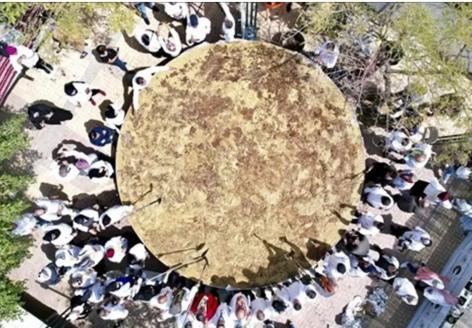 بالصورة: أكبر طبق مجدرة في مدينة أريحا الفلسطينية