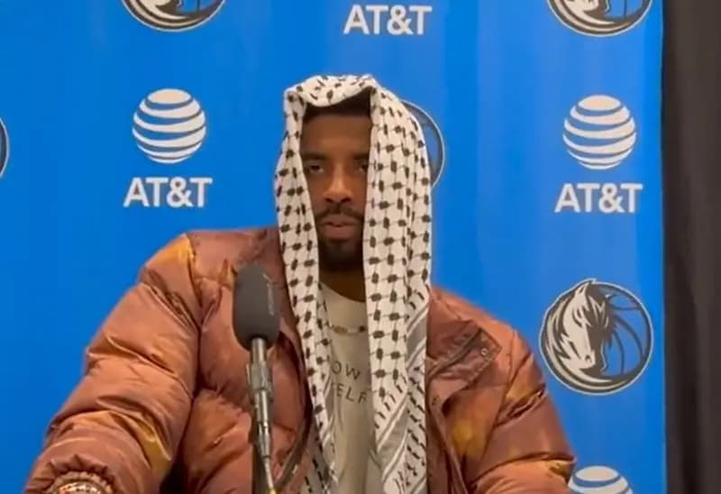 نجم "NBA" يتحدى ناديه ويظهر بالكوفية الفلسطينية